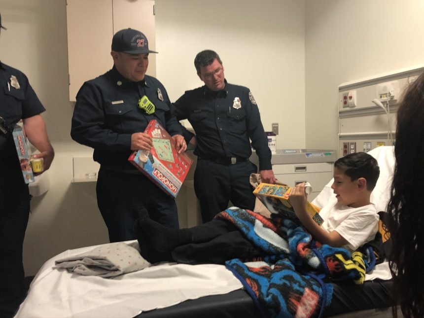 Firefighters visit children