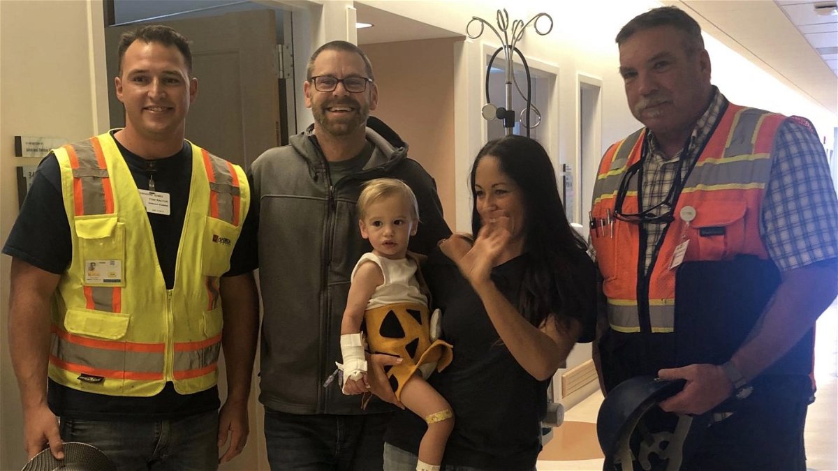 Sebastian and the construction workers he met through the hospital window.
