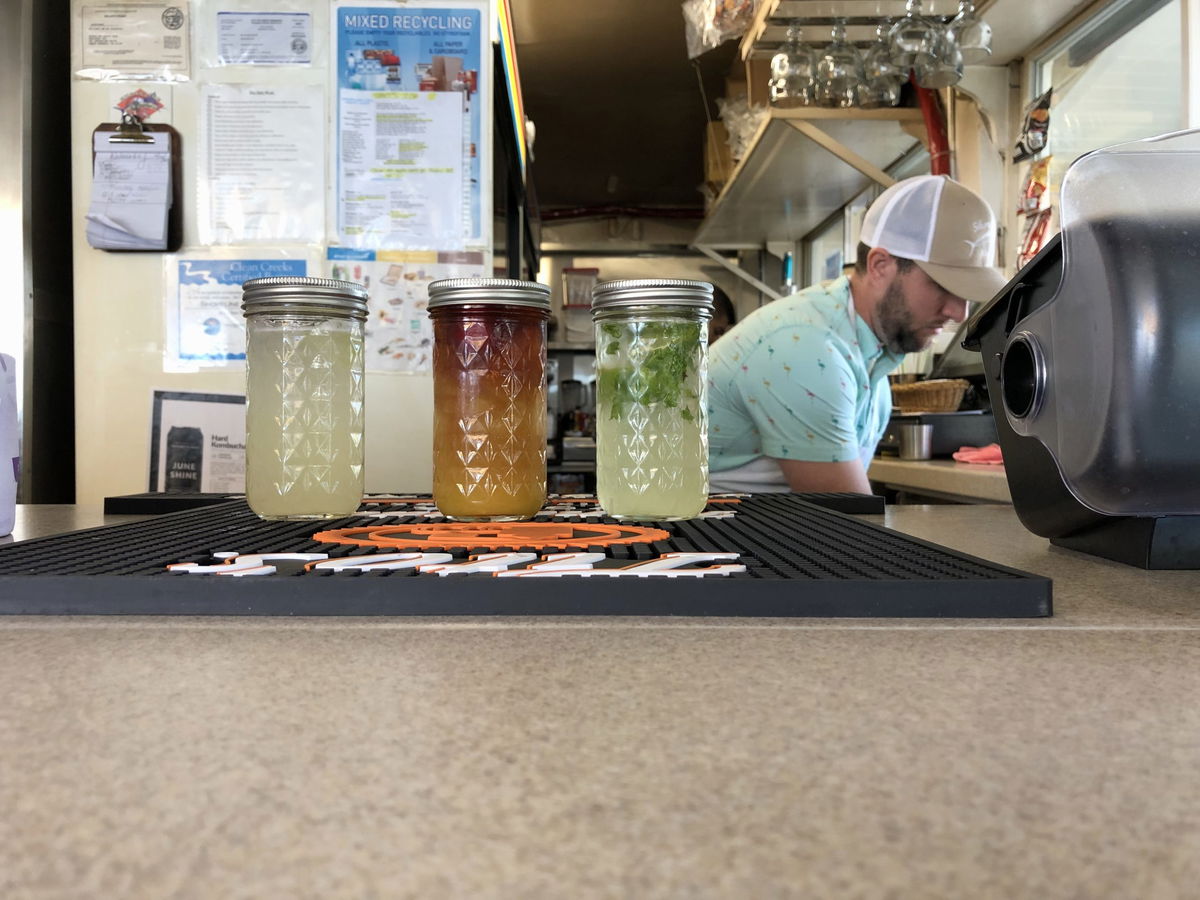 To-go alcholic beverages are now permitted at bars, wineries, distilleries, and breweries that operate out of a meal service's kitchen.