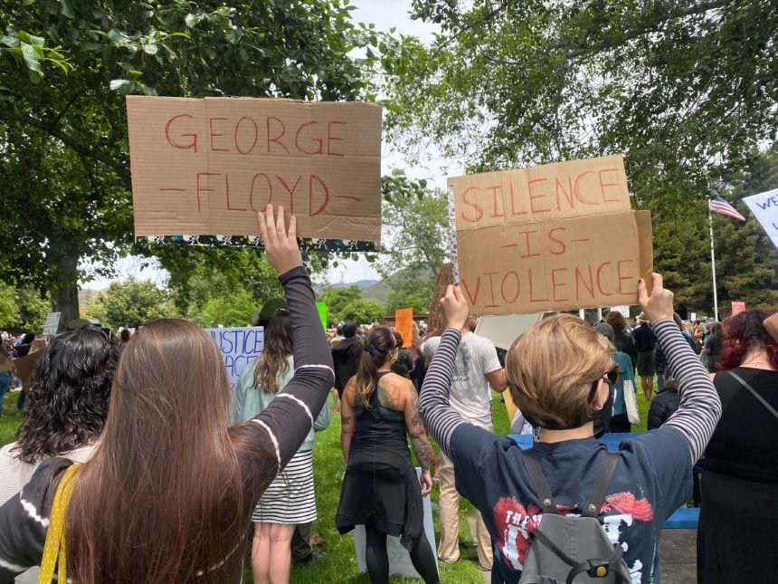 slo protest signs