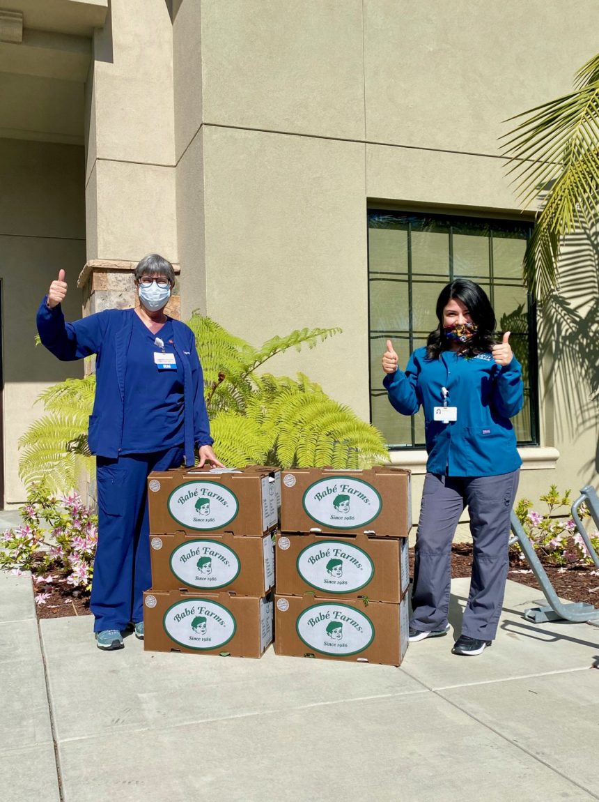 Mission Hope Cancer Center Staff Receiving Produce Boxes