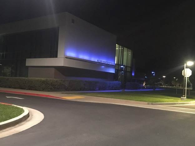Allan Hancock College lights campus buildings blue to honor first