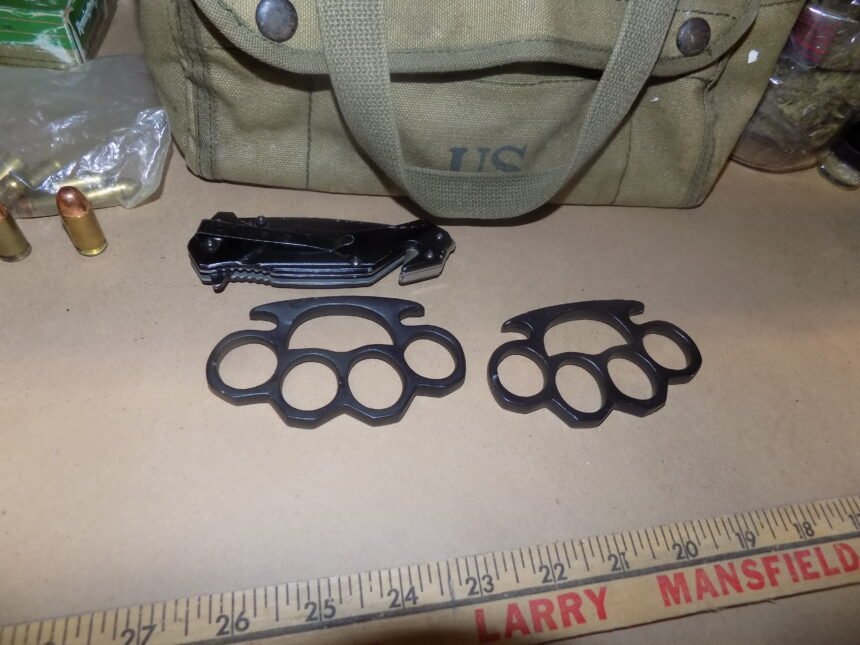 brass knuckles from domestic violence arrest