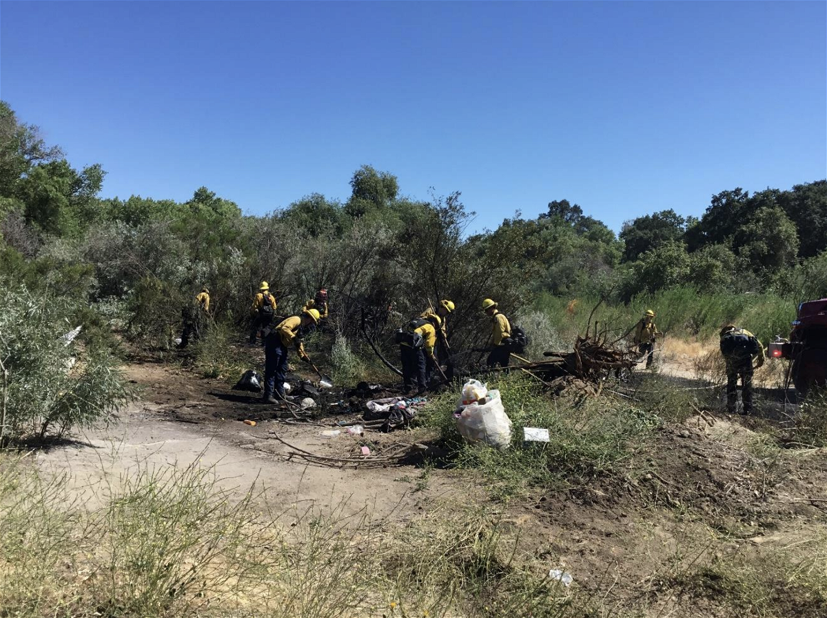 Fire crews put out a spot fire in the Salinas Riverbed Sunday