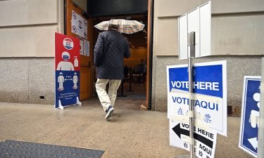 A voter arrives at a polling station set up at The Metropolitan Museum of Art on New York's primary election day on June 22.