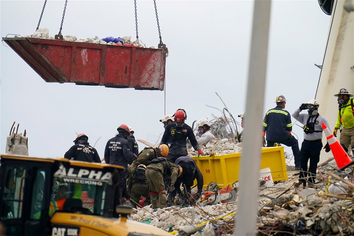 <i>Gerald Herbert/AP</i><br/>Rescue teams are entering their seventh day searching the rubble of a collapsed building in Surfside