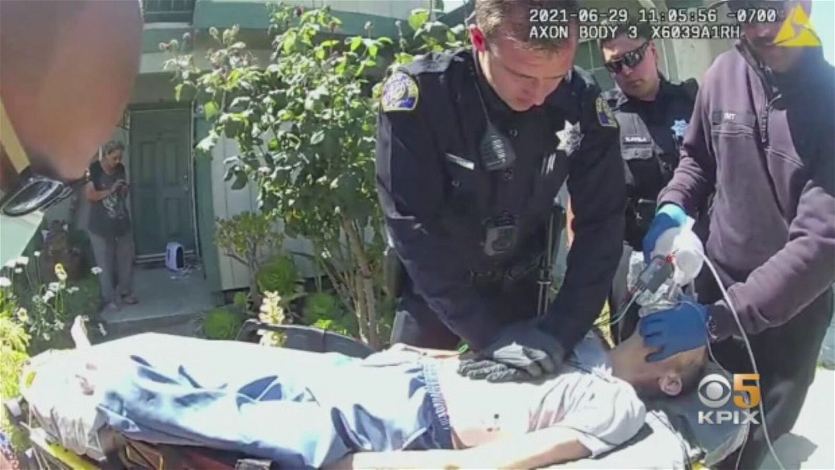 <i>San Jose Police</i><br/>Body cam footage of Officer Christopher Reed performing chest compressions on a woman who suffered a heart attack following a house fire on June 29