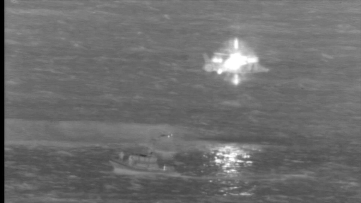 <i>U.S. Coast Guard</i><br/>The US Coast Guard says the two cargo plane crew members were in stable condition when they were rescued by a USCG MH-65 Dolphin helicopter and a Honolulu Fire Department rescue boa