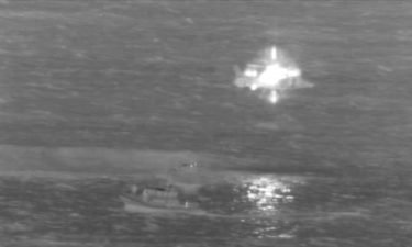 The US Coast Guard says the two cargo plane crew members were in stable condition when they were rescued by a USCG MH-65 Dolphin helicopter and a Honolulu Fire Department rescue boa