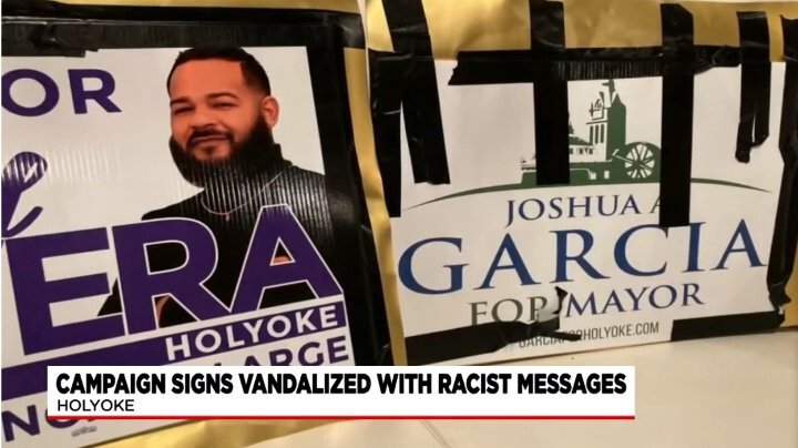<i>WSHM</i><br/>Campaign signs for Israel Rivera (left) and Joshua Garcia were vandalized with a racist message.