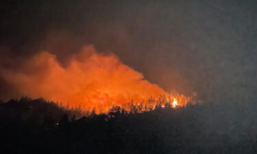 Crews battle the Dixie Fire in northern California.