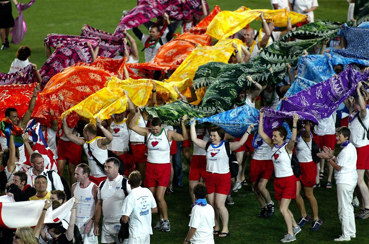 <i>GREG WOOD/AFP/Getty Images</i><br/>Participants from the United Kingdom team march onto the field during the opening ceremony of the 2002 Gay Games in Sydney