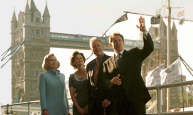 US President Bill Clinton and his wife Hillary pose in front of London's Tower Bridge with British Prime Minister Tony Blair his wife Cherie