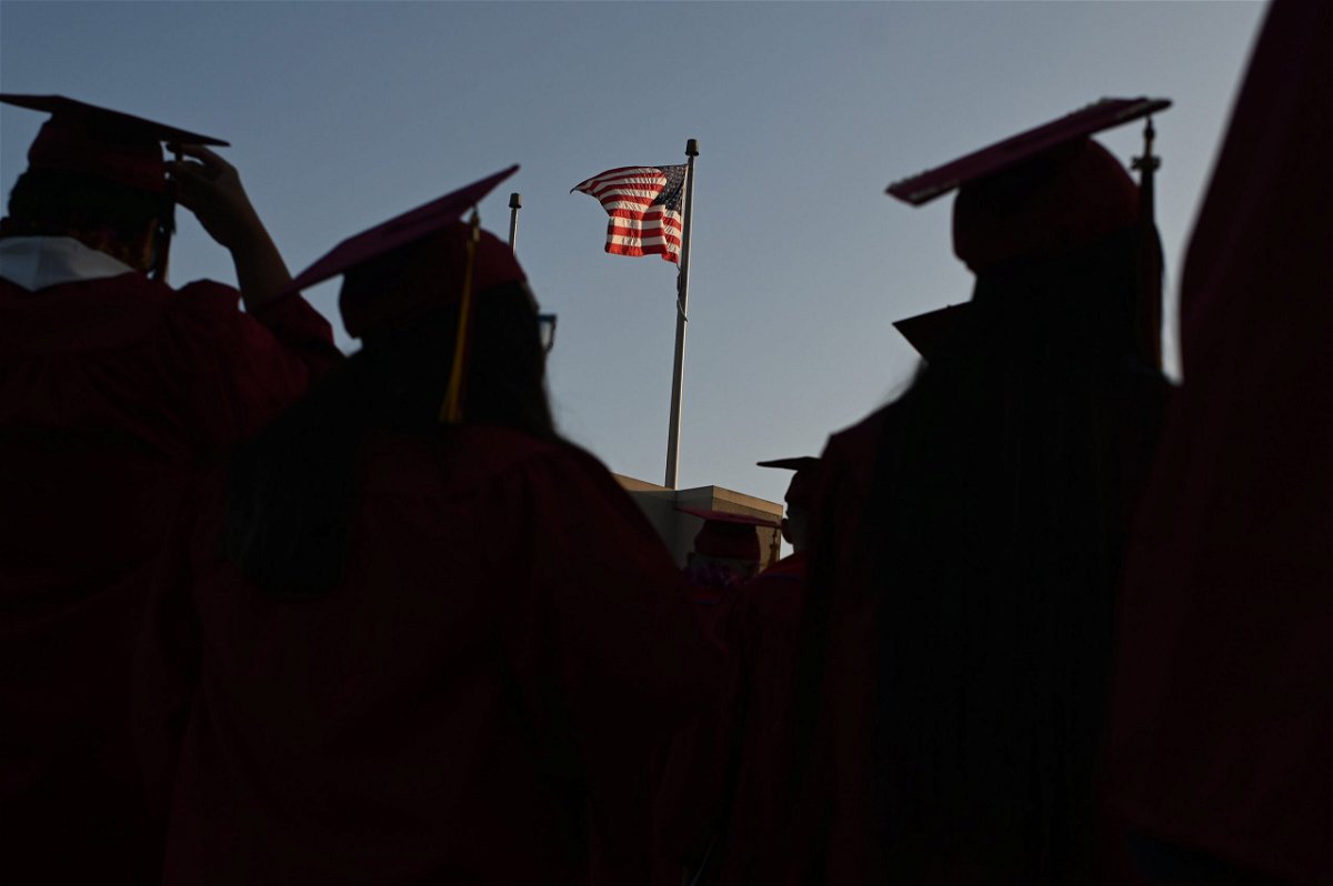 <i>ROBYN BECK/AFP/Getty Images</i><br/>Students participate in a graduation ceremony on June 14