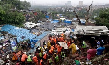 At least 31 people were killed when torrential rain swept through India's financial capital late on July 18