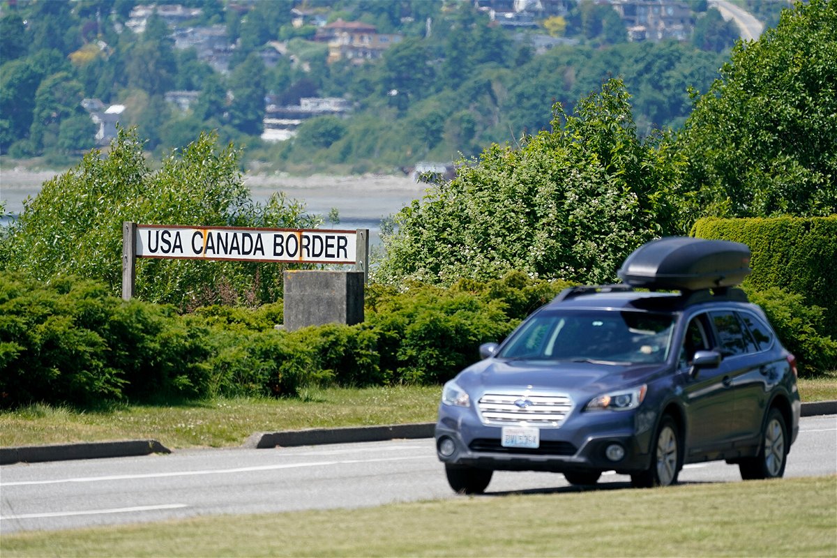 <i>Elaine Thompson/AP</i><br/>A car heads into the US from Canada at the Peace Arch border crossing on June 8