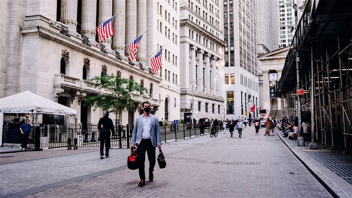 <i>Nina Westervelt/Bloomberg/Getty Images</i><br/>A pedestrian passes by the New York Stock Exchange (NYSE) building in New York