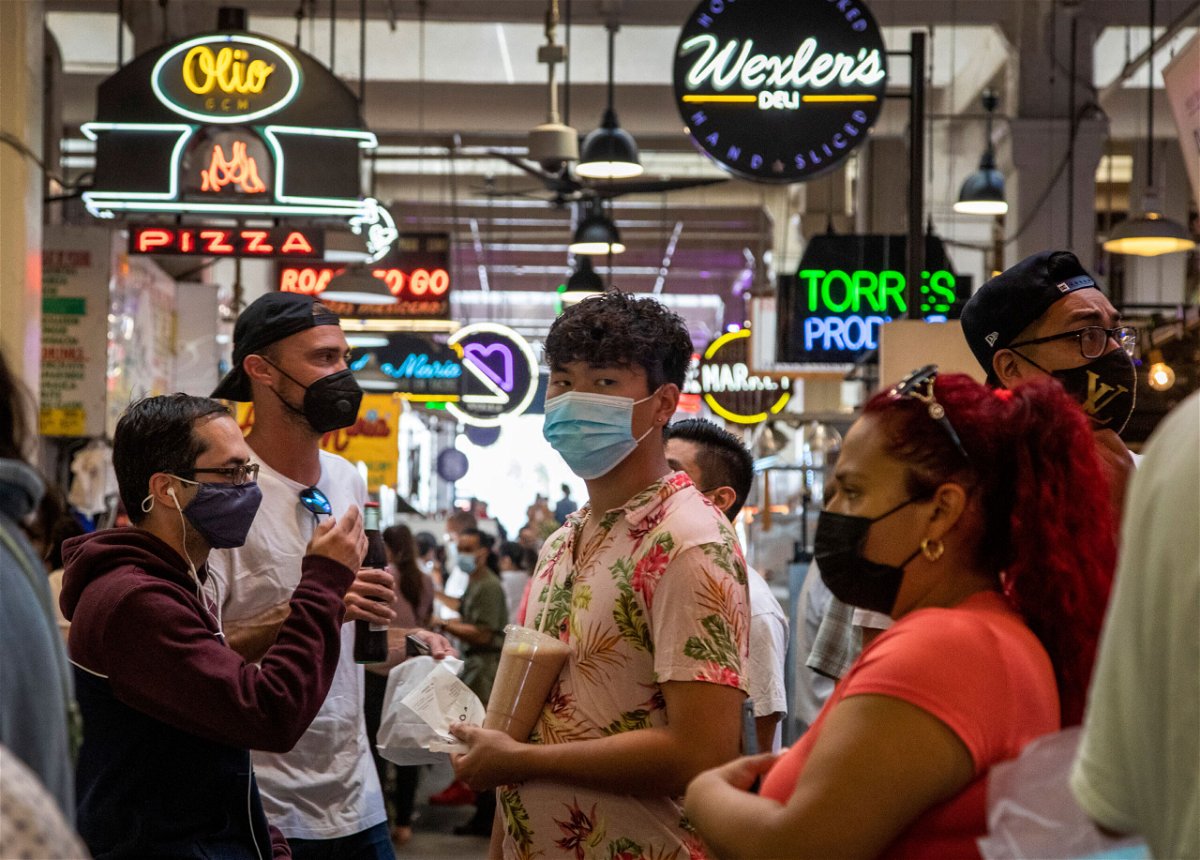 <i>Brian van der Brug/Los Angeles Times/Getty Images</i><br/>Visitors to the Grand Central Market are mostly masked on July 27