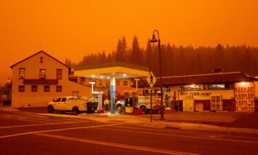 Firefighters gas up while battling the Dixie Fire in the Greenville community of Plumas County