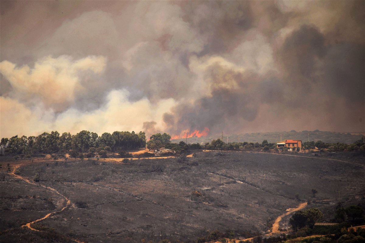 <i>Alessandra Chergia/KONTROLAB/LightRocket/Getty Images</i><br/>Hills burn on the Italian island of Sardinia
