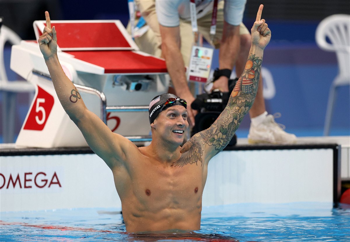 <i>Al Bello/Getty Images</i><br/>Caeleb Dressel of Team USA reacts after winning the gold medal in the Men's 100m Freestyle Final on July 29 in Tokyo
