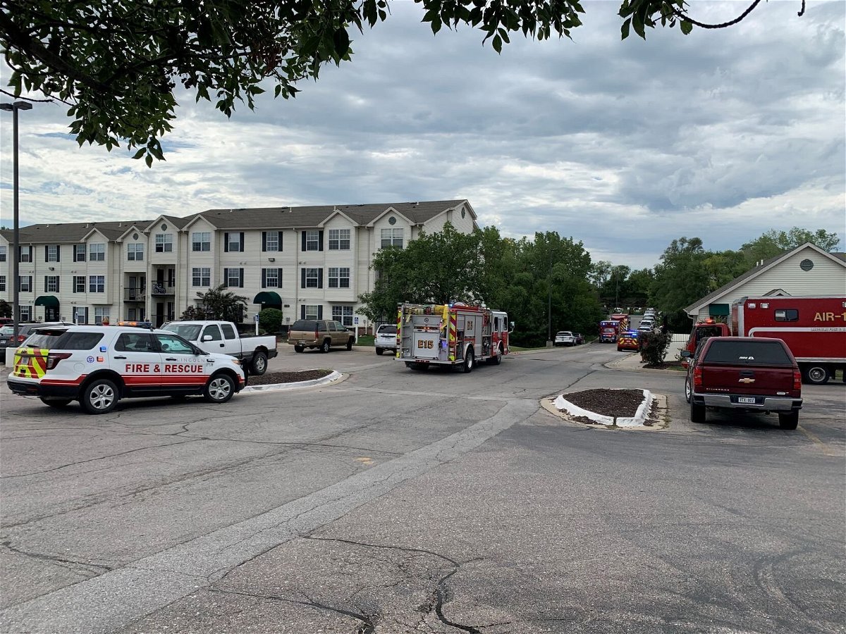 <i>Andrew Wegley/Journal Star</i><br/>Lincoln Fire and Rescue crews responded to the Bridgeport Apartments after a man who barricaded himself in an apartment to avoid arrest lit a fire in the unit's bathroom