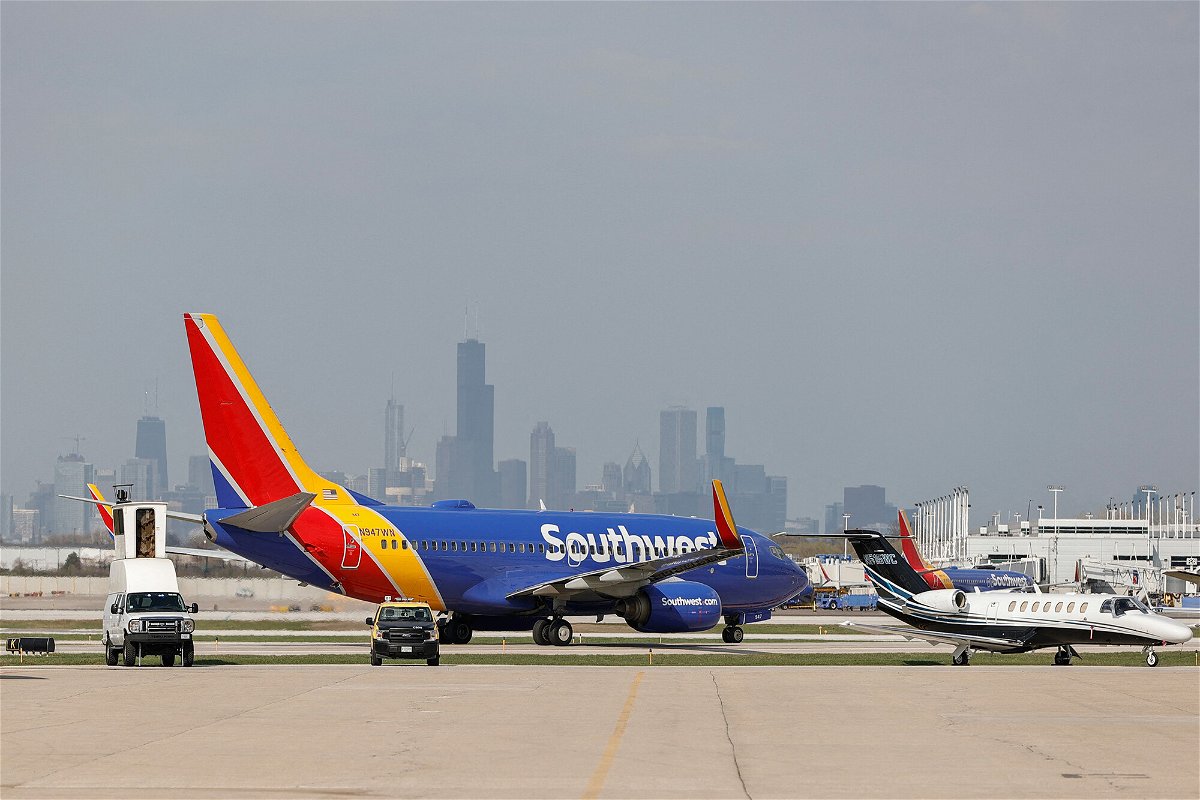 <i>Kamil Krzaczynski/AFP/Getty Images</i><br/>Southwest Airlines will cut the number of flights it operates this fall. Pictured is a Southwest Airlines jet taxiing at Midway International Airport in Chicago