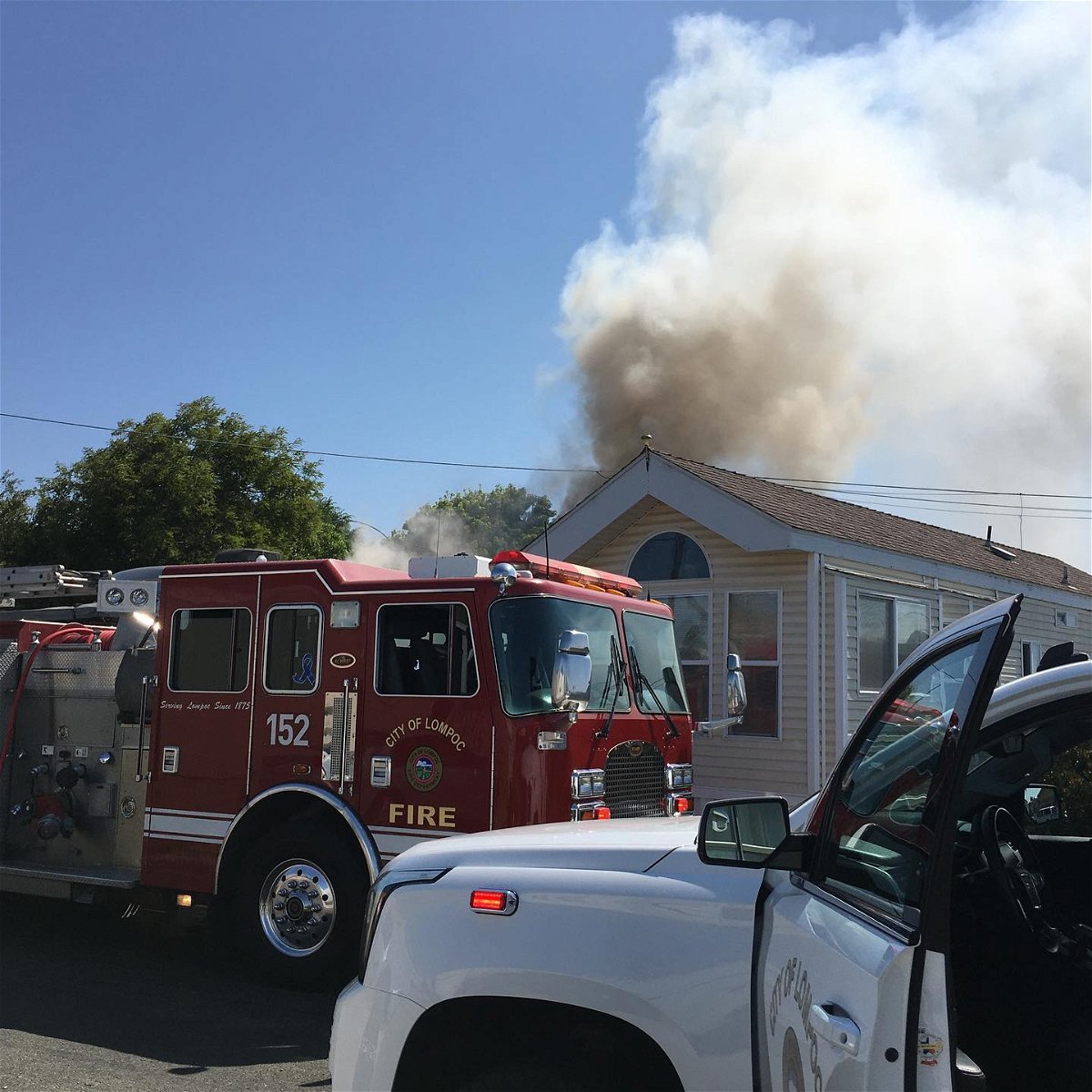 Firefighters battled a fire burning at a Lompoc mobile home Tuesday morning