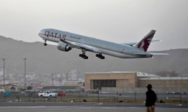 A Qatar Airways aircraft takes off from the airport in Kabul on September 9.