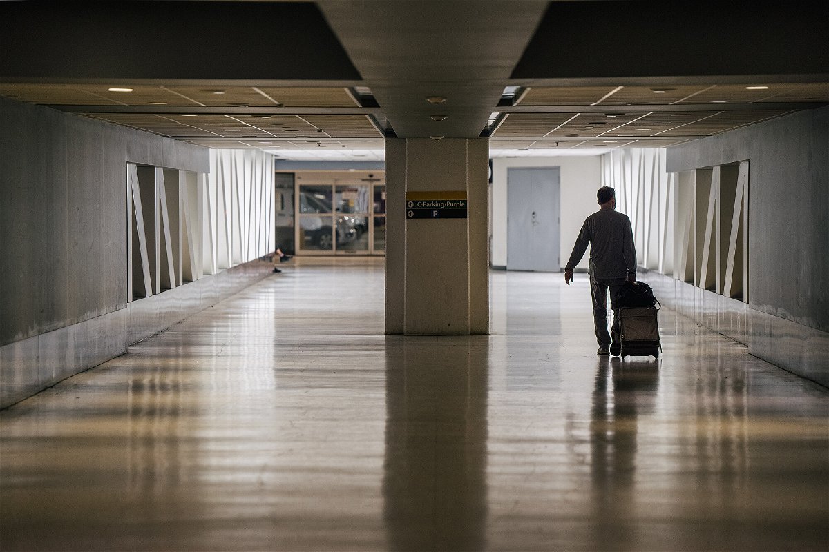 <i>Brandon Bell/Getty Images</i><br/>Airlines were counting on a post-Labor Day surge in business travel. It looks like that won't happen. A traveller here walks through the George Bush Intercontinental Airport on August 05