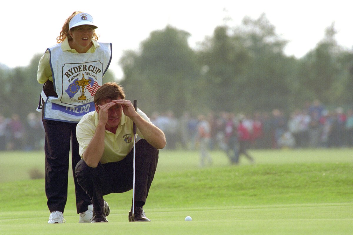 <i>Ross Kinnaird/EMPICS/Getty Images</i><br/>Europe's Faldo and his caddy Sunesson deliberate over a putt.