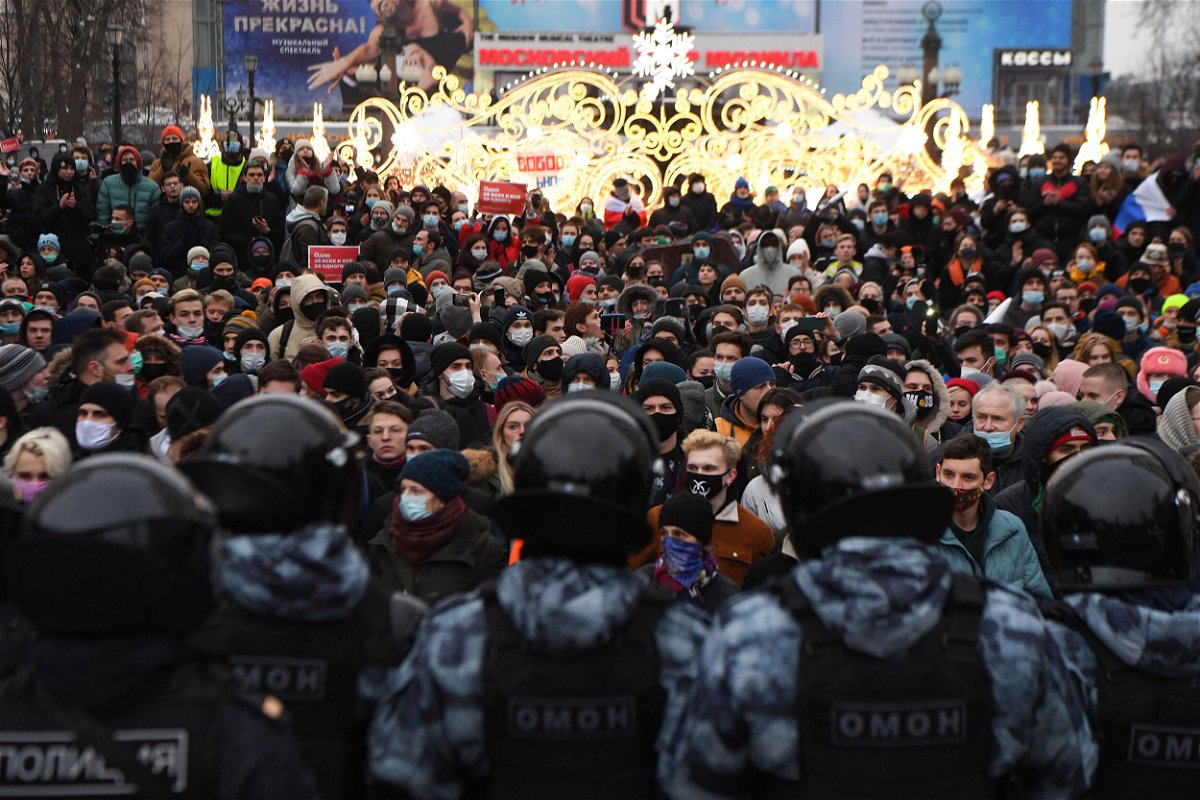 <i>Natalia Kolesnikova/AFP/Getty Images</i><br/>People attend a rally in support of Navalny in downtown Moscow on January.