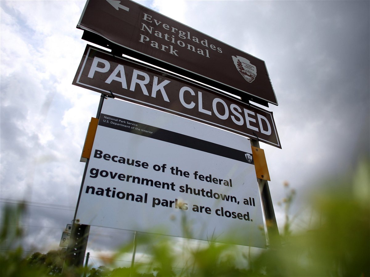 <i>Joe Raedle/Getty Images</i><br/>A sign near the entrance to the Everglades National Park is seen indicating it is closed on October 7