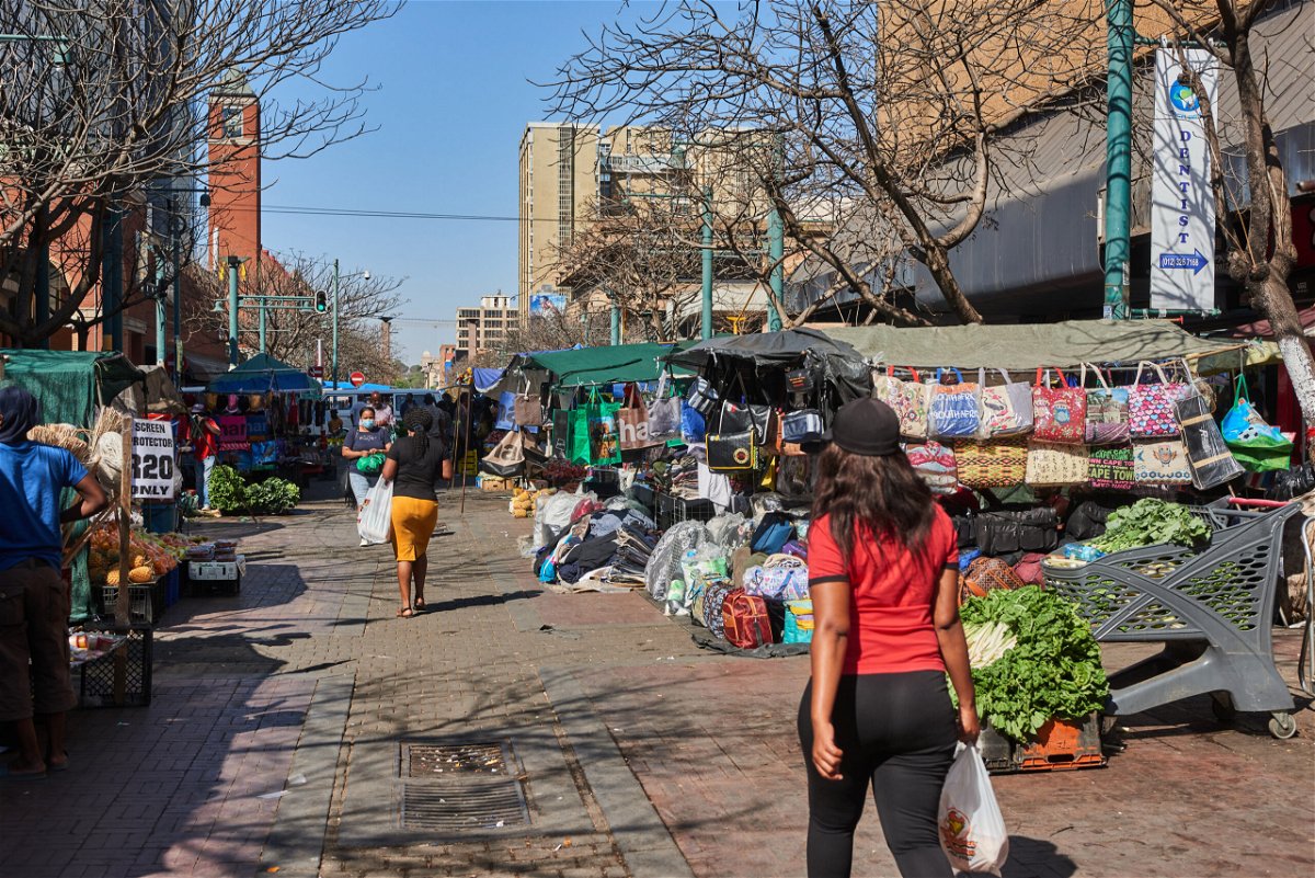 <i>Waldo Swiegers/Bloomberg/Getty Images</i><br/>Shoppers in a market in the central business district of Pretoria