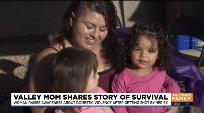 <i>KPHO KTVK</i><br/>Vanessa Martinez holds her two young children in Mesa