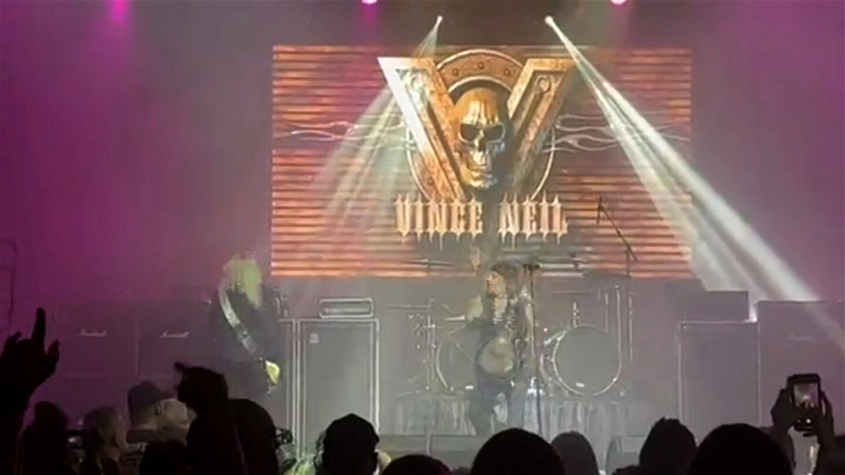 <i>Darrell Jenkins/Twitter</i><br/>Mötley Crüe singer Vince Neil performs with his solo band just seconds before he fell off stage in Tennessee on  October 15.