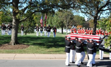 Marines remove Harold Hayden's casket before his funeral at Arlington National Cemetery.