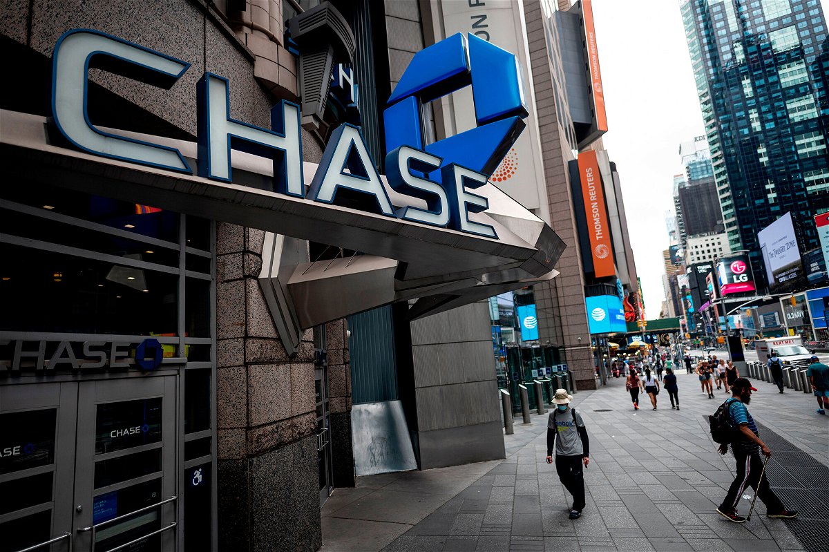 <i>Johannes Eisele/AFP/Getty Images</i><br/>JP Morgan Chase CEO Jamie Dimon says worst of pandemic may soon be over. A Chase bank is seen at a branch in June 2020 in New York City.