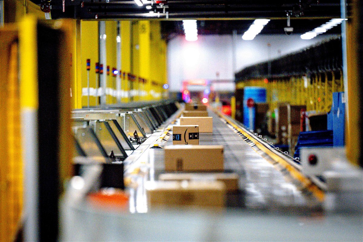 <i>Watchara Phomicinda/MediaNews Group/The Press-Enterprise/Getty Images</i><br/>Packages move along a conveyor at Amazon fulfillment center in Eastvale on Tuesday