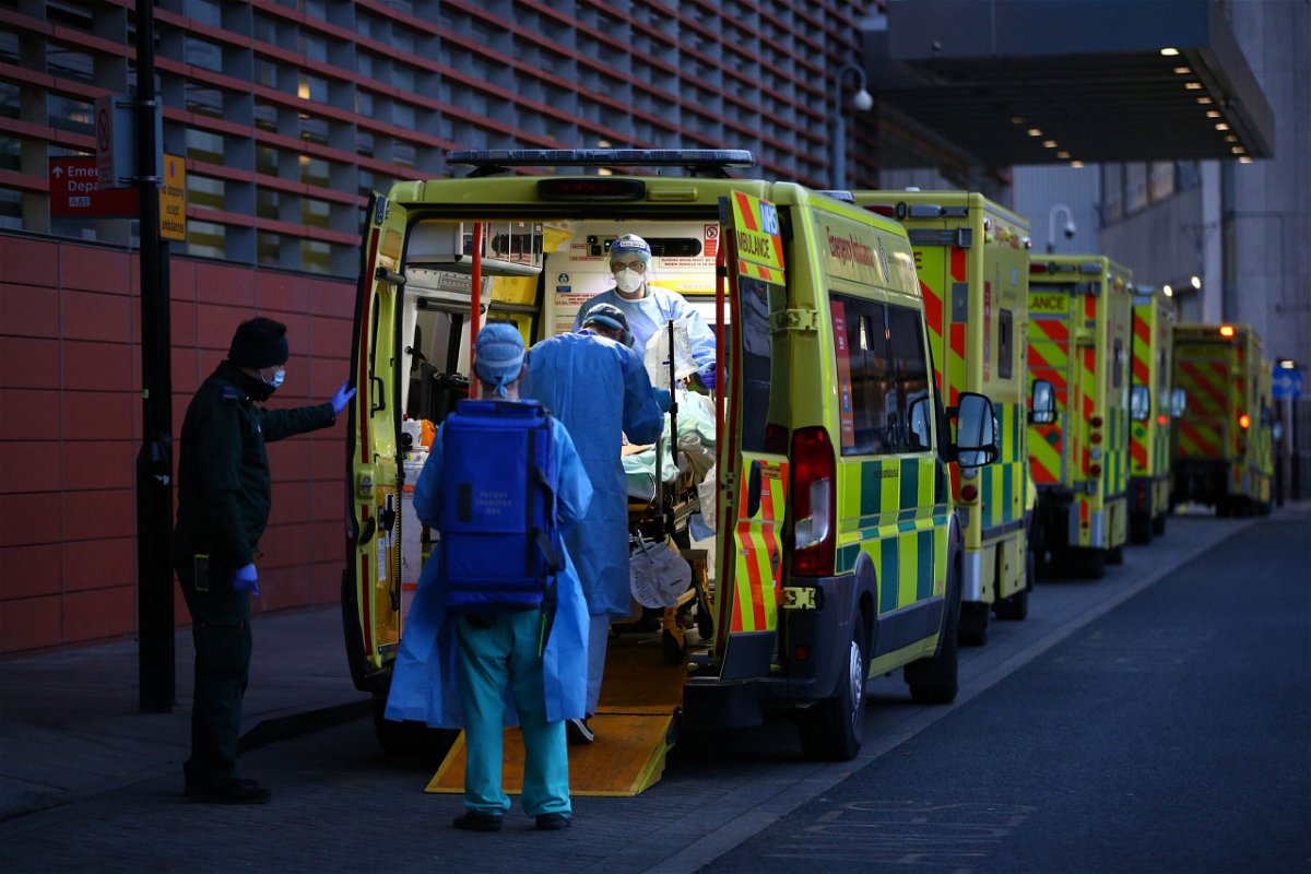 <i>Hollie Adams/Getty Images</i><br/>British and international authorities are closely monitoring a subtype of the Delta variant that is causing a growing number of infections in the United Kingdom. A row of ambulances in London in January is seen.