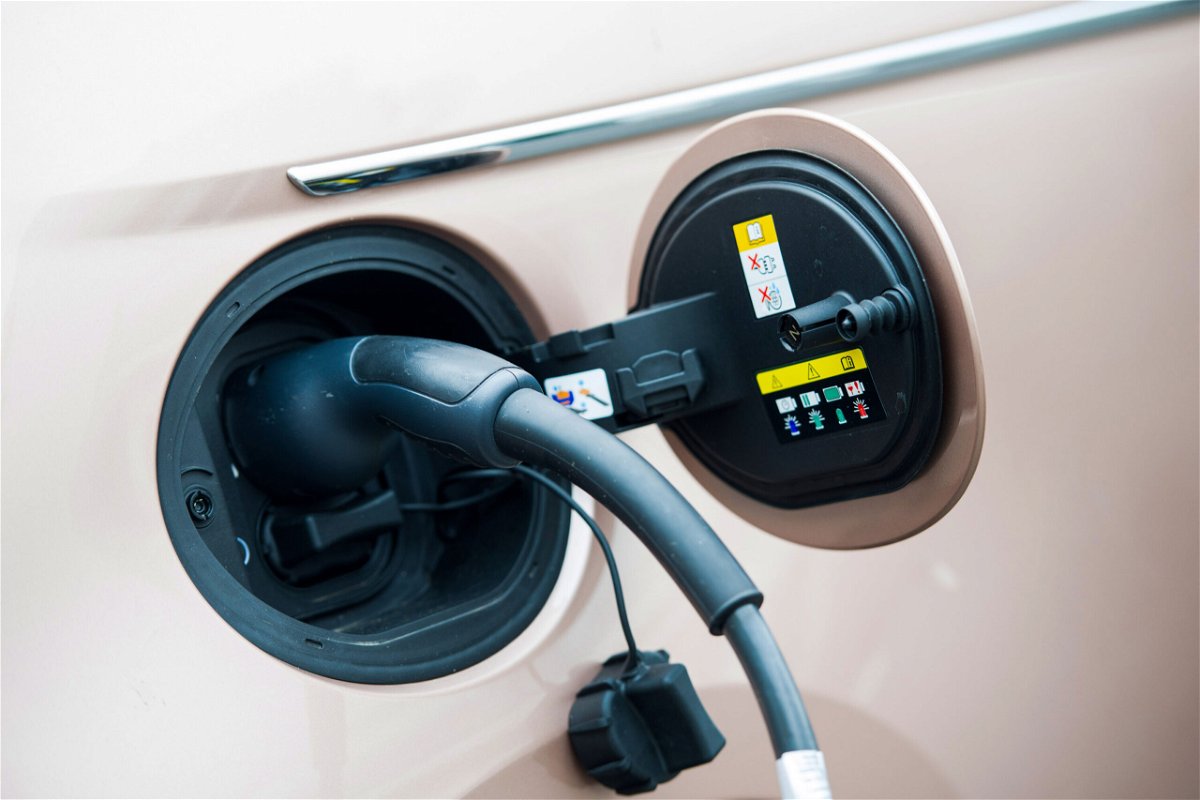 <i>Nathan Laine/Bloomberg/Getty Images</i><br/>A charging plug connected to a Fiat 500e electric automobile outside a Fiat showroom