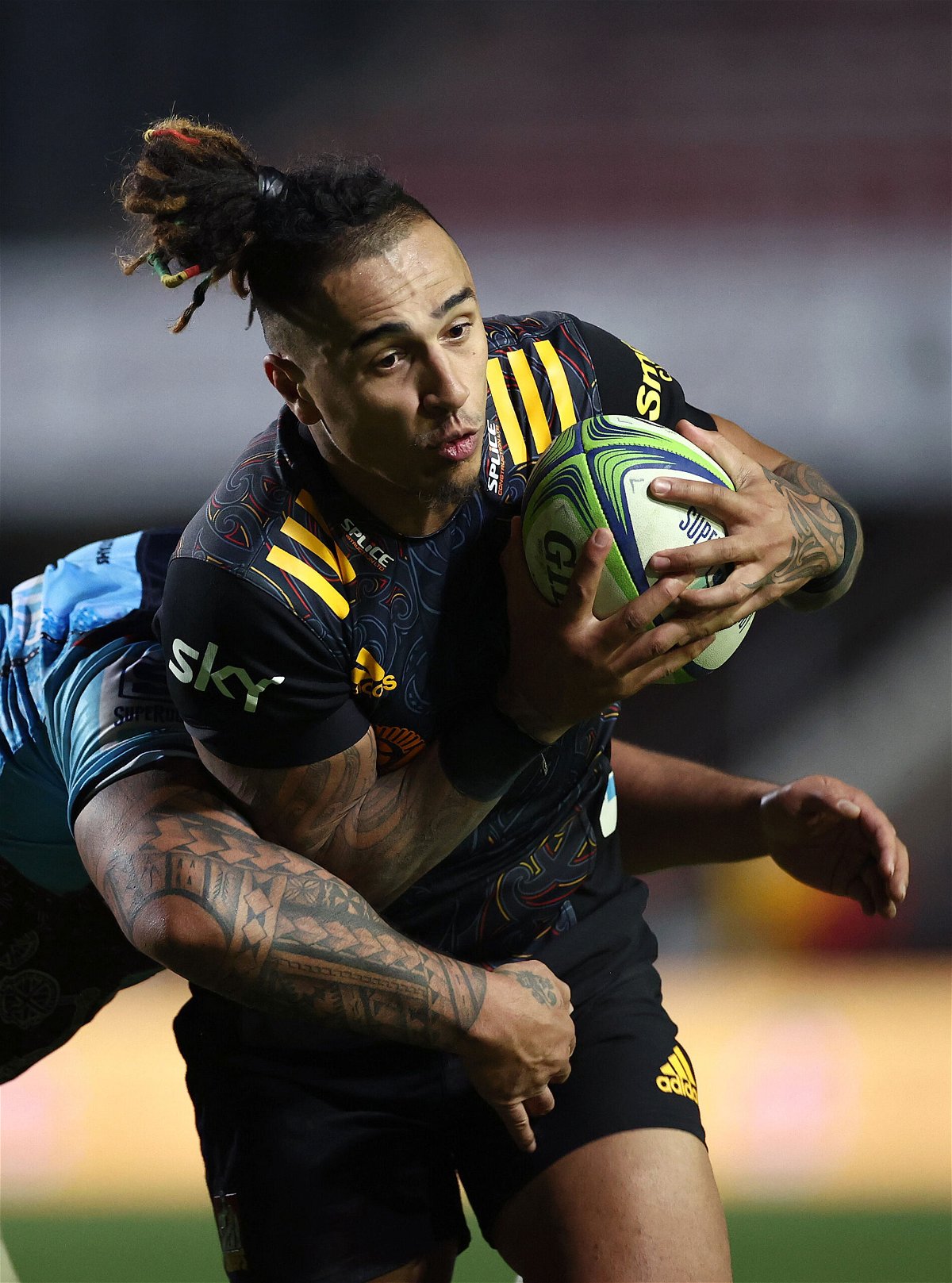 <i>Cameron Spencer/Getty Images</i><br/>Sean Wainui of the Chiefs is tackled during the round five Super Rugby Trans-Tasman match between the NSW Waratahs and the Chiefs at Brookvale Oval on June 12