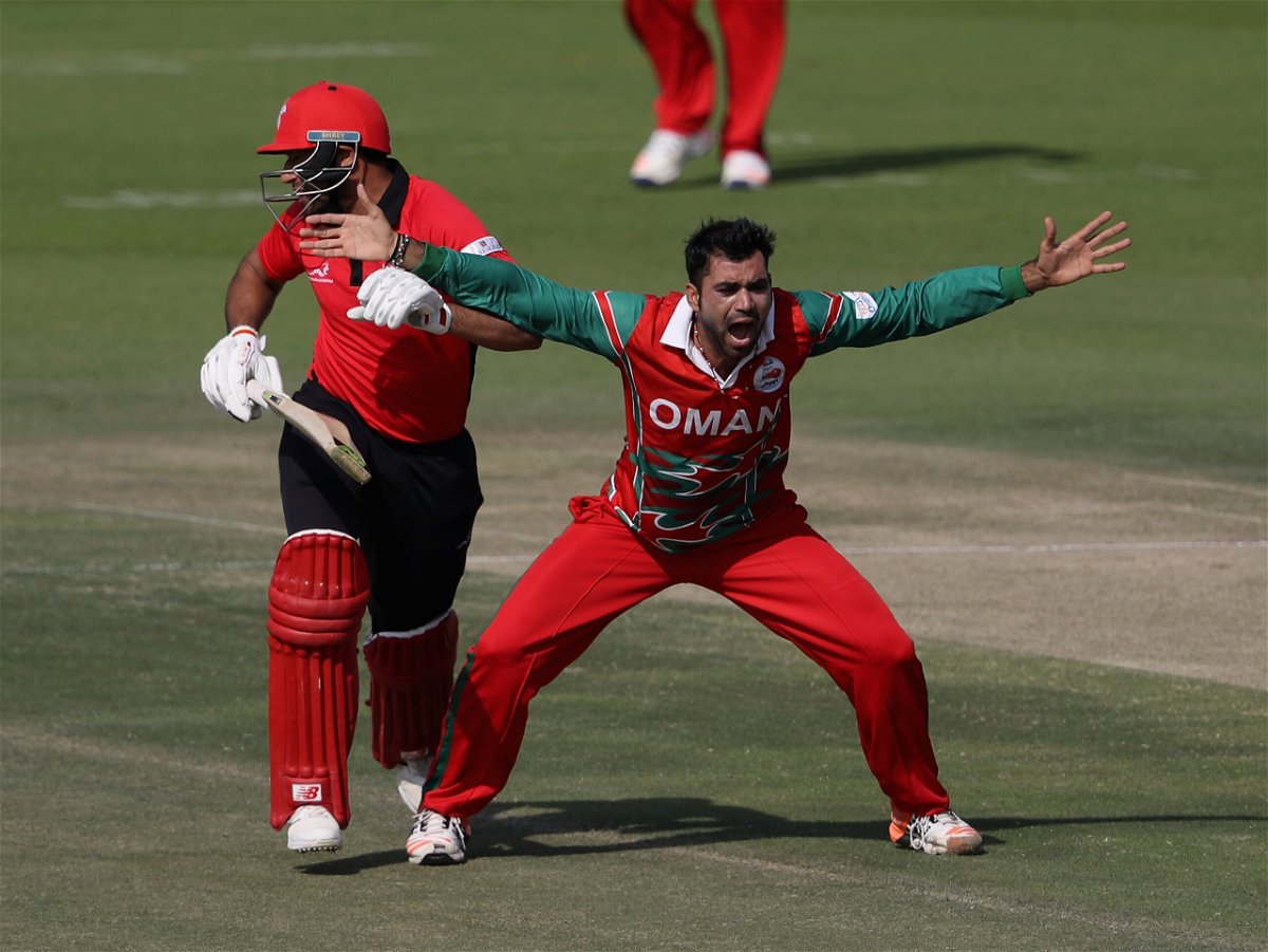 <i>Francois Nel/Getty Images Europe/Getty Images</i><br/>Oman's Bilal Khan appeals against Hong Kong at the 2017 Desert T20 Challenge.