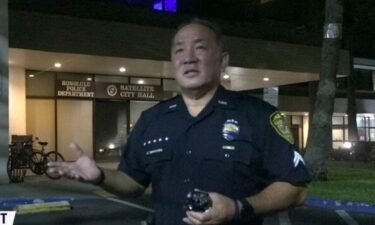 A Honolulu Police officer is being hailed a hero