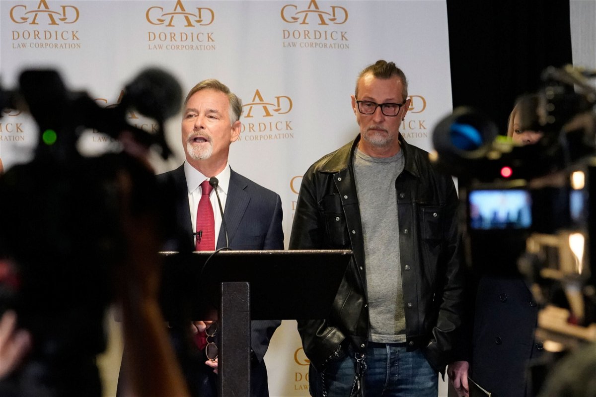 <i>Damian Dovarganes/AP</i><br/>'Rust' movie crew member have filed a lawsuit against actor Alec Baldwin and others involved with production after the fatal film set shooting. Attorney Gary Dordick (left) speaks alongside his client Serge Svetnoy.
