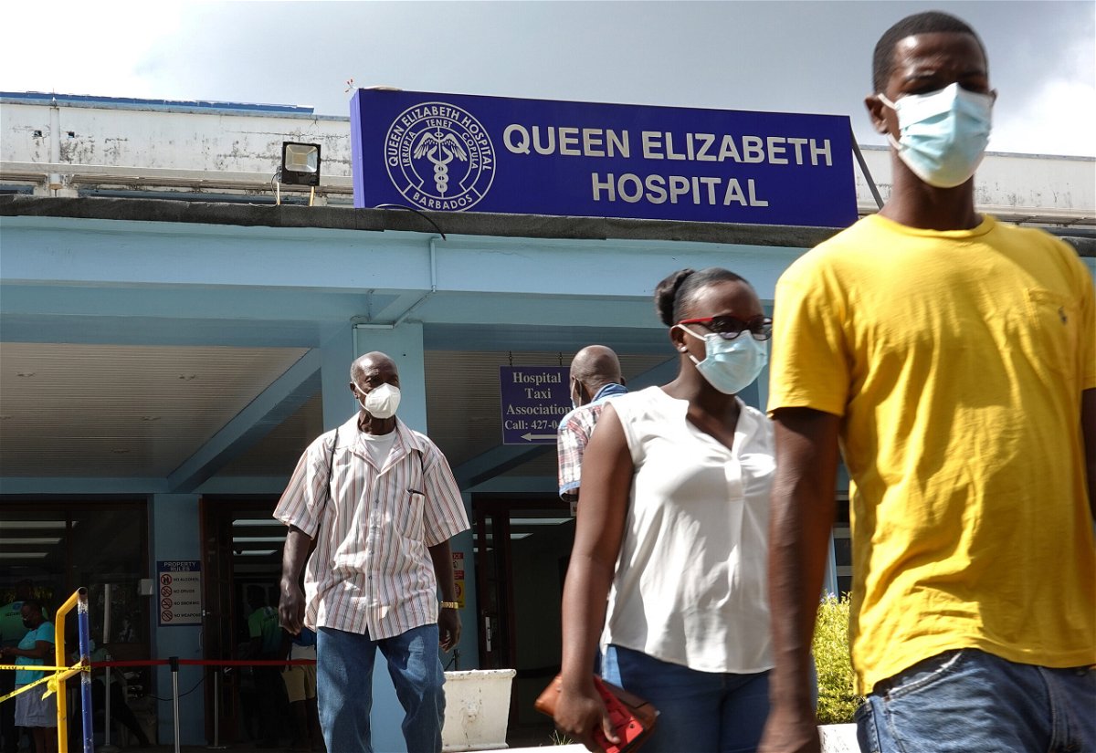 <i>Joe Raedle/Getty Images</i><br/>People walk from the entrance to the Queen Elizabeth hospital in Bridgetown