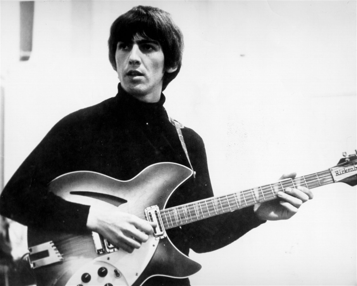 <i>Michael Ochs Archives/Getty Images</i><br/>George Harrison records on a Rickenbacker electric guitar in the studio in around 1965.