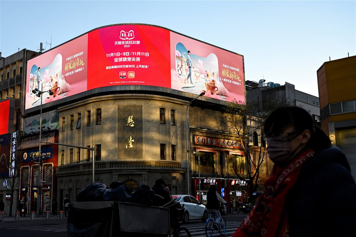 <i>Jade Gao/AFP/Getty Images</i><br/>People walk past a billboard promoting the annual 