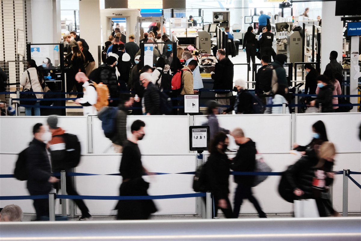 <i>Spencer Platt/Getty Images</i><br/>Travelers arrive for flights at Newark Liberty International Airport on November 30 in Newark