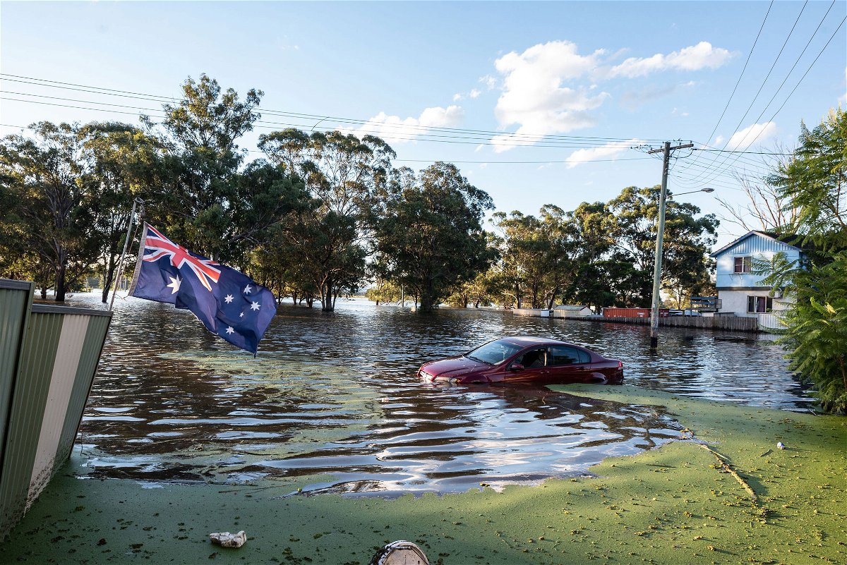 <i>Flavio Brancaleone/Getty Images</i><br/>Australians are bracing for a wet and windy summer for a second year in a row as meteorologists said Tuesday that a La Niña weather event had formed in the Pacific Ocean. A car half submerged in a flood on March 24